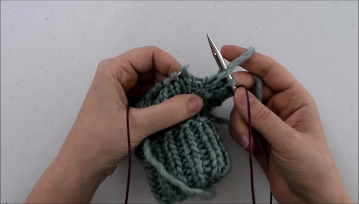 Knit through the back.