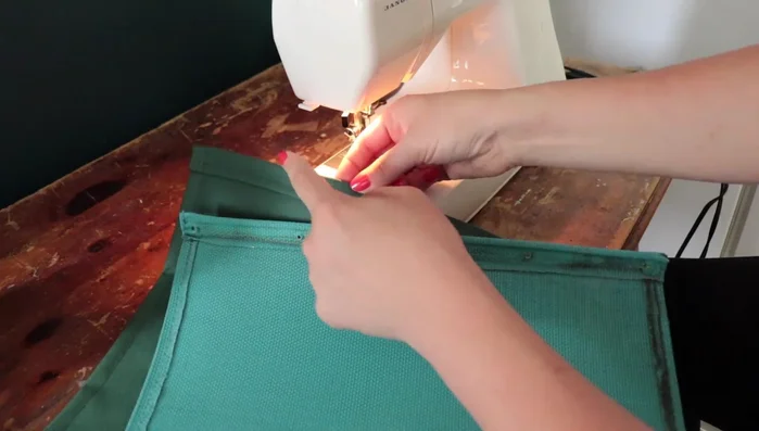 Create a small pocket along one side hem to accommodate the stabilizing rod from the original design.