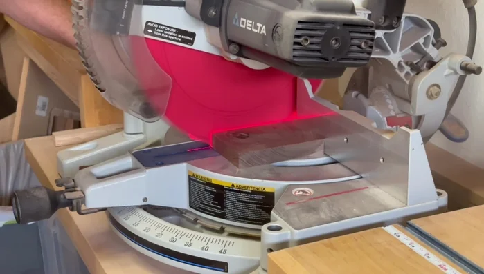 Resaw the board down the middle using the bandsaw to create two 3/8-inch thick pieces for the top and bottom.