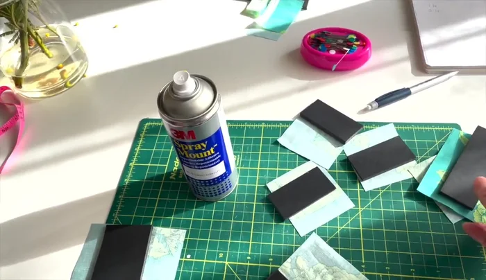 Glue fabric to foam core board pieces. Apply spray adhesive to the back of fabric and adhere to foam board. Work outdoors to avoid fumes. 