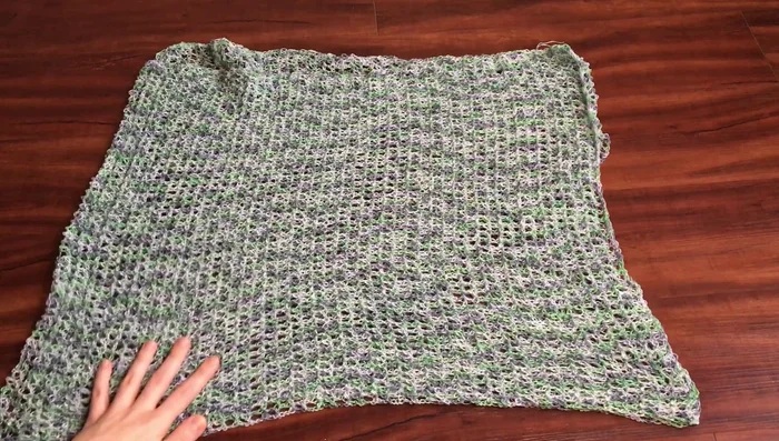 Sew in the ends. Add any desired details, such as fringe.