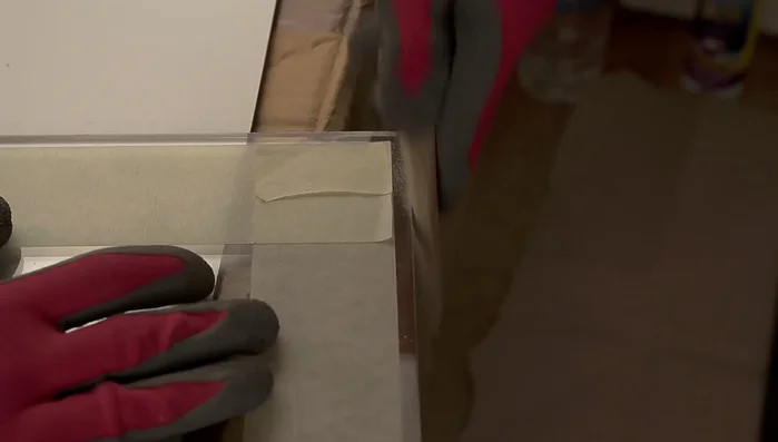 Apply silicone sealant and bond the back and front panels, then the sides. Use weights to hold pieces in place while the silicone dries.