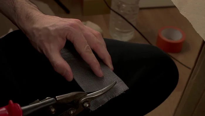 Prepare and attach the lower ventilation grid.