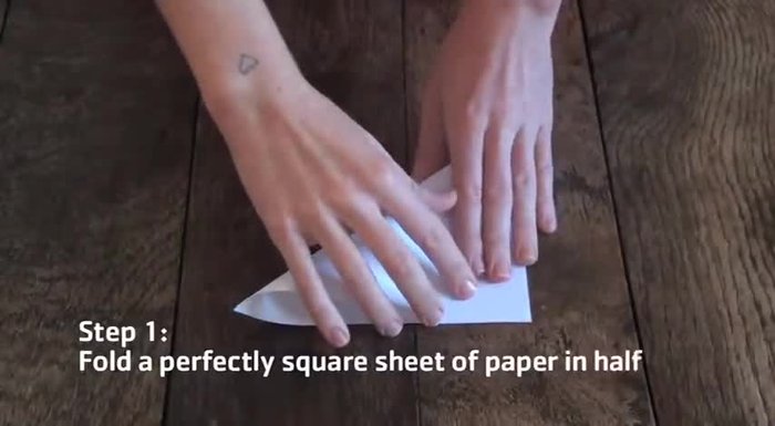 Repeat the fold to form another diagonal square.