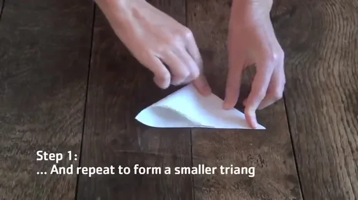 Repeat the fold to form another diagonal square.