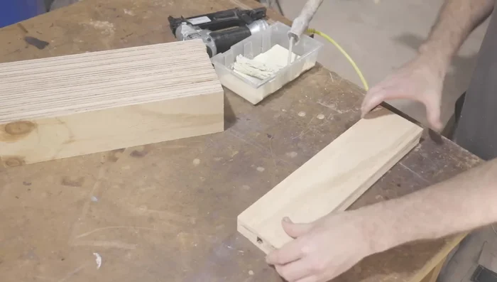 Assemble the ladder using glue and nails. Avoid using clamps by assembling in a way that allows the glue and nails to hold the pieces together.