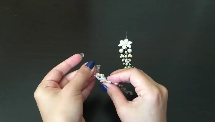 Attach the ear wires to the loop.