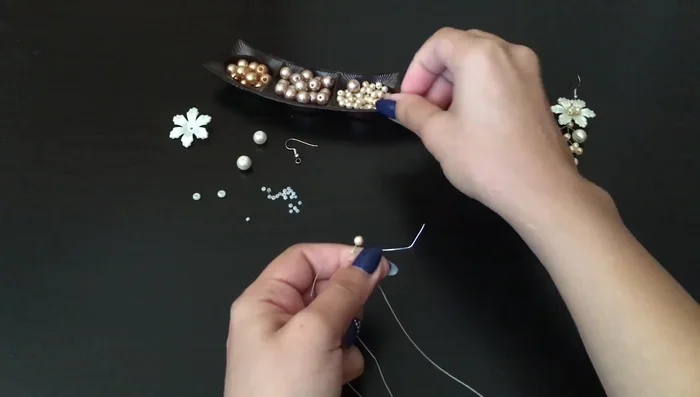 Add a branch with one pearl, twisting eight times.