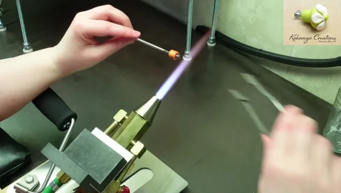 Continue shaping the shank until it's round and flat on the bottom for a stable base.