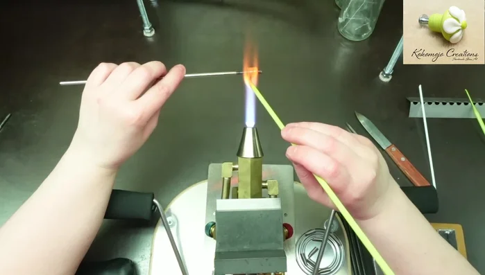 Continue shaping the shank until it's round and flat on the bottom for a stable base.