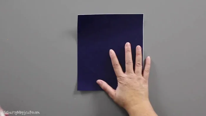 Apply transfer tape to the weeded vinyl, then carefully transfer the design to the back of the cleaned glass plate.