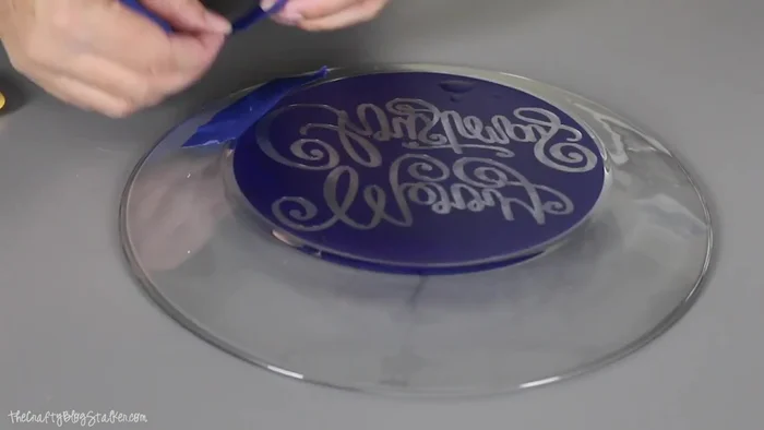 Use painter's tape around the edges of your design to protect the glass from accidental etching.