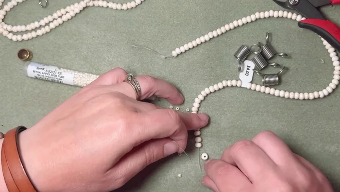 Adjust strand lengths by adding or removing beads until all strands match in length and pattern. 