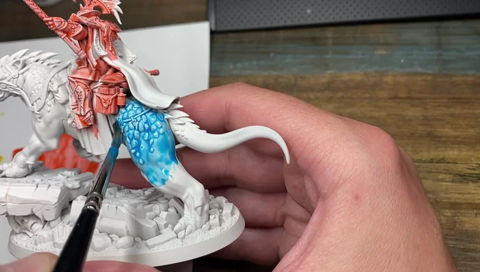 Mix Frostheart contrast paint with contrast medium (50/50). Apply one coat to the entire model, ensuring the paint doesn't pull too much.