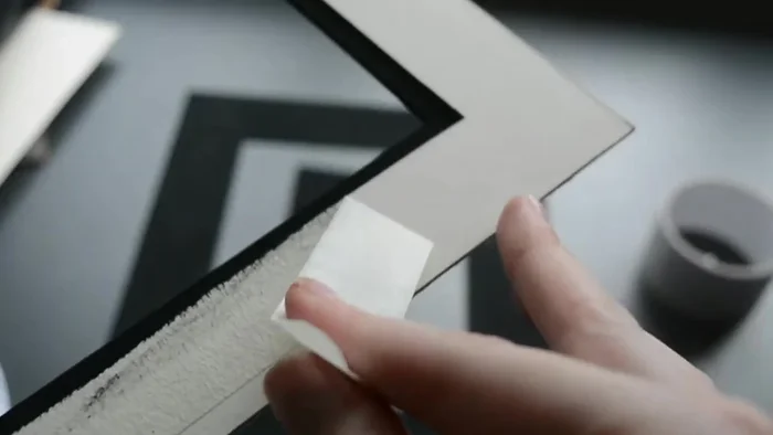 Prepare mounts. Paint them black (or white and then black/gold details) or create your own oval mounts from cardboard.