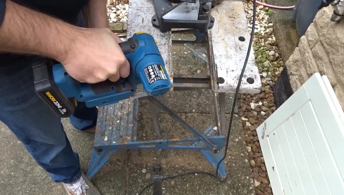 Round over the ends using a jigsaw and the coin as a guide.