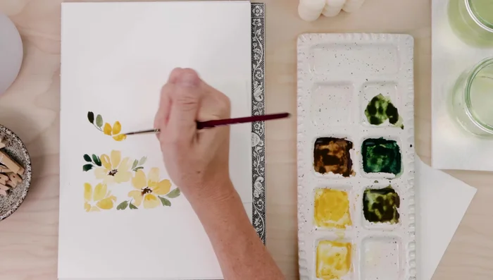 Add brown dots to create stamens.