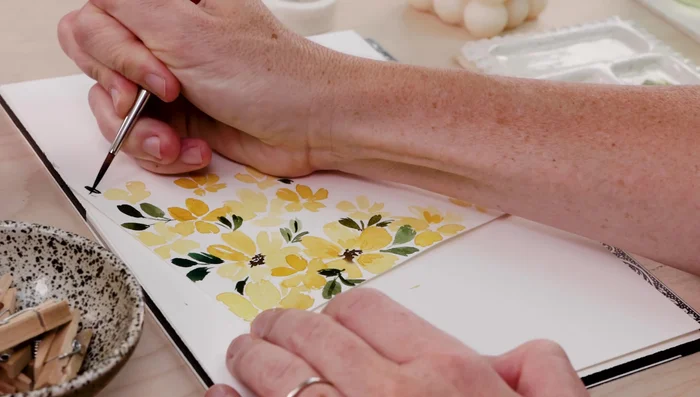 Add brown dots to create stamens.