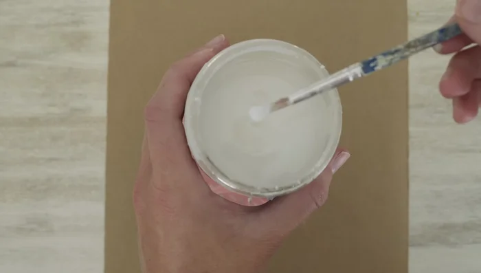 Glue beads back on: Use E6000 glue and a toothpick to carefully glue the beads back into place.