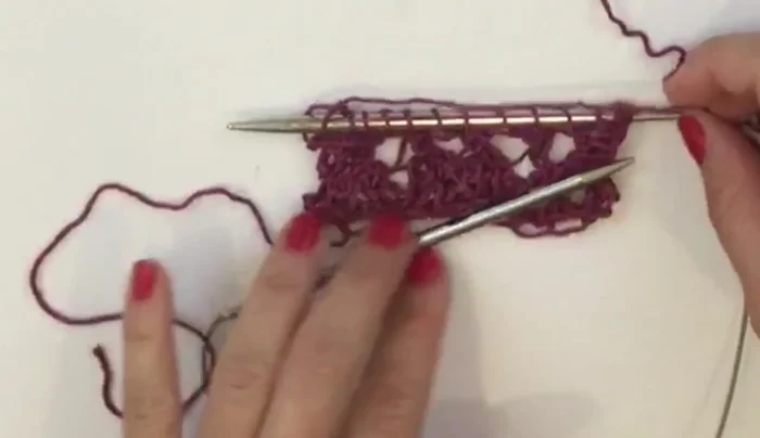 Changing yarn colors: Carry the tails of both colors along for the salvage stitches. Knit the first stitch with the new yarn, then knit the next stitches with all three strands (new yarn, tail of old yarn, and tail of new yarn). After the salvage stitches, continue with only the working yarn.