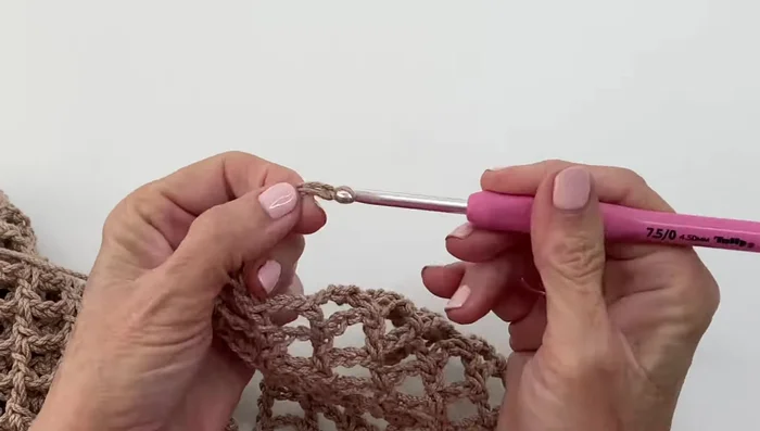 Strap Increase: Rows 20-23: Increase from six to fourteen squares using treble crochet and chain 2 increase pattern. 