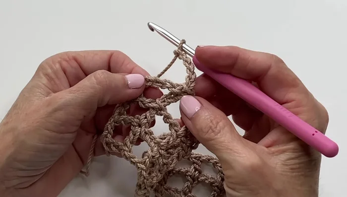 Rounds 3 & 4: Repeat the pattern from Round 2, increasing by two squares each round. Remember corner chains are always chain 5. 