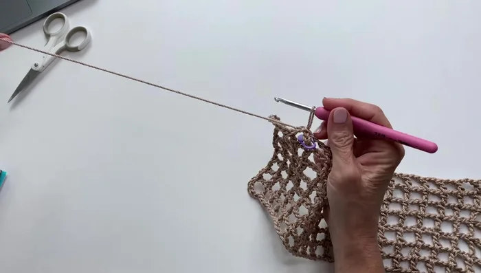 Rounds 5-24: Continue with the same sequence as Round 3 and 4, but without increasing. This forms the sides of the bag.