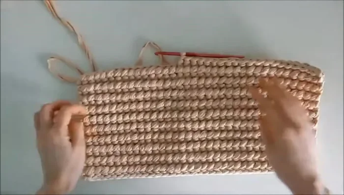 Edge Finishing: Crochet two additional rows around the perimeter. On the chosen 'front' side, work into the connecting columns loosely to avoid tightening. Work two double crochet stitches into each corner.