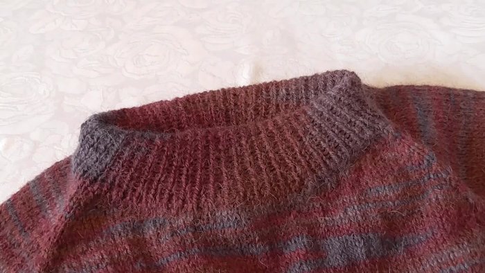 Place markers to separate sleeve stitches from the back and front pieces. Place a marker to indicate the front.