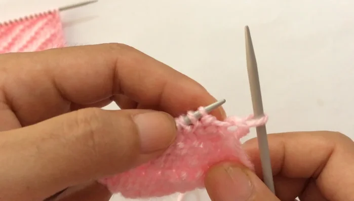 **Row 10:** Slip the first edge stitch purlwise, then repeat the pattern: purl four, knit one (until you reach the last stitch). Knit the last edge stitch.