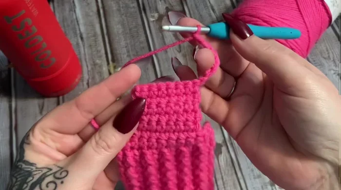 Single crochet in the last stitch of the chain-5, then two more single crochets in the same stitch (corner).