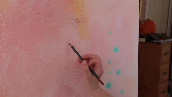 Sketch focal point (e.g., portrait) with graphite pencil and cover with matte gel medium to prevent smudging.