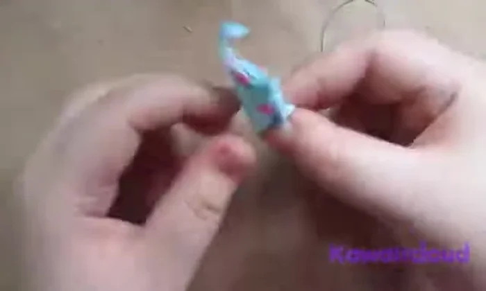 Close the opening with stitches to complete the first step (creating a loop).