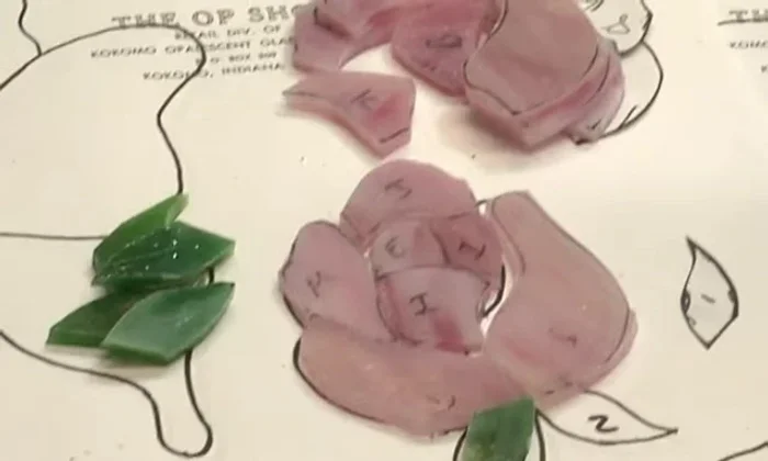 Grind off the rough edges of the glass pieces.