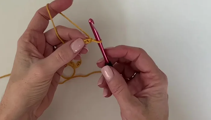 On the last stitch of the row, do NOT chain one; instead, single crochet directly into it. Chain one and turn.