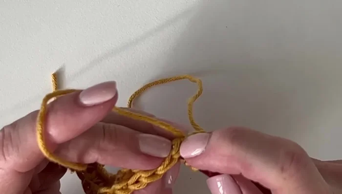 Continue working rows until the desired length is reached. The blanket in the tutorial was worked to approximately 34 inches.