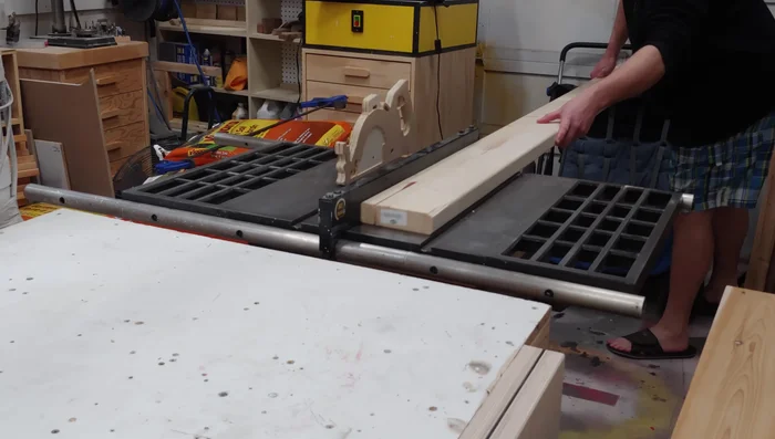 Attach the pine support to the long sides of the box using glue, 2-inch brad nails, and 2-inch construction screws.