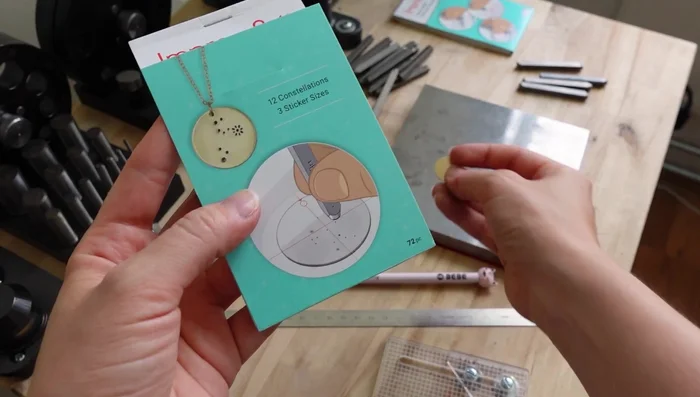 Flatten the stamped disc using a mallet.