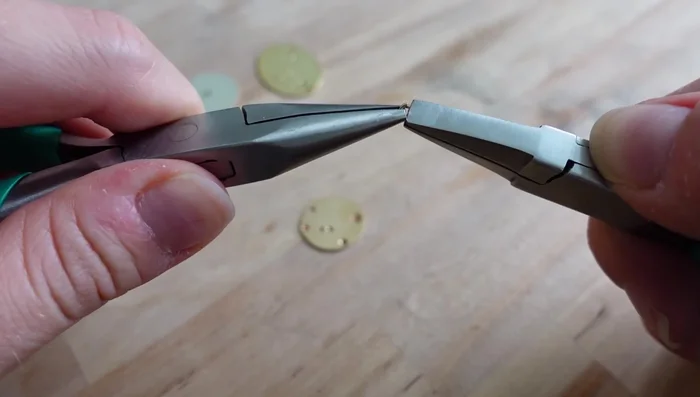 Attach jump rings and chains using flat nose pliers.