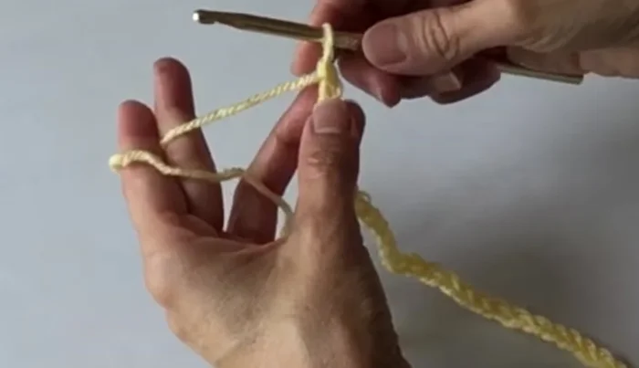 Do a row of double crochets across (53 total).