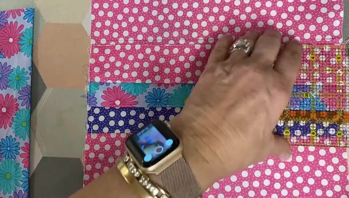 Divide Pockets: Sew a line down the center of the pocket area to create two sets of pockets.