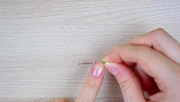 Prepare the bug's legs and antennae using pins with balls and size 15 seed beads.