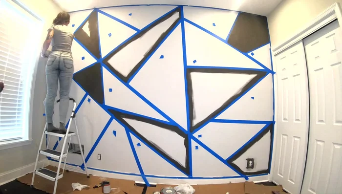 Paint the shapes. Consider cutting in around borders first or using a roller directly.