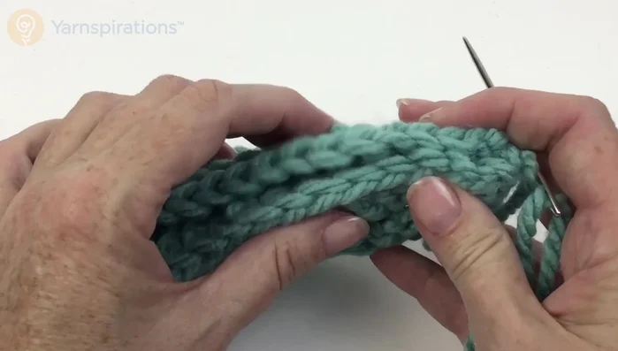 Sew up the side seam, using the back loops of the stitches for a neater finish.