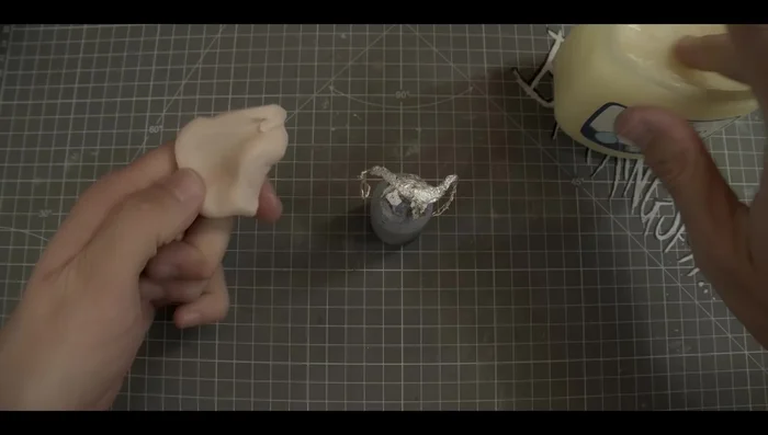 Apply petroleum jelly to the foil armature.