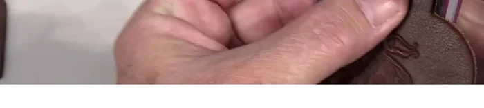 Smooth the edges of the baked clay using a coarse nail file.