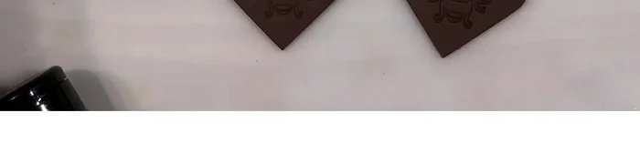 Add paint to the stamped design, then wipe off the excess to highlight the details.