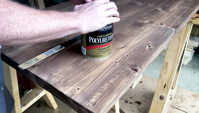 Apply polyurethane: Apply at least three coats of oil-based polyurethane, sanding lightly (320 grit) between coats.