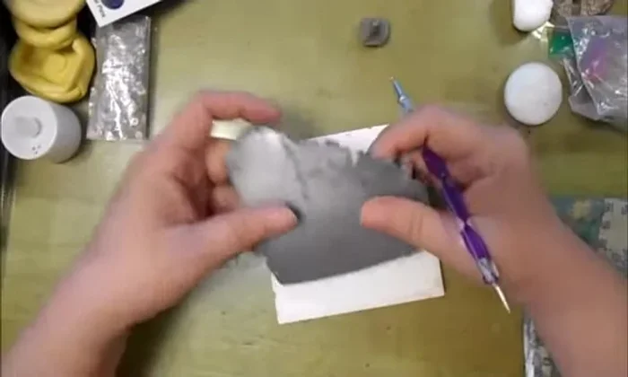 Shape the clay into a general shape for your initials or design. 