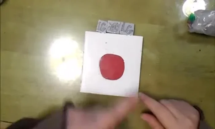 Once cooled, use your new custom stamp on the back of your polymer clay pendants, making sure to stamp on a small block of clay, not the pendant directly.